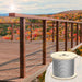 Modern cable railing installation using 3/16" 7x19 wire rope on a professional deck system.