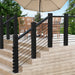 Multiple black 30 degree beveled washers for cable railing hardware, matte black finish.